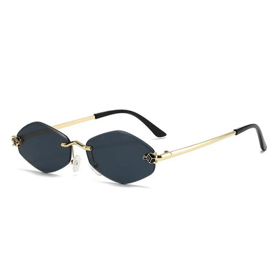 Lunettes de soleil La Parisienne Glassy Mood verres noirs monture dorée légère élégante