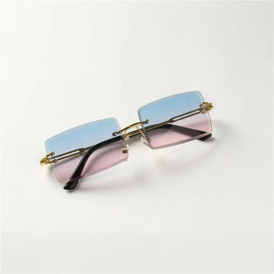 Lunettes de soleil tendance Berlin avec verres dégradés bleu et rose et monture dorée Glassy Mood