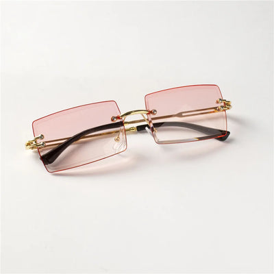 Lunettes de soleil tendance Berlin avec verres roses rectangulaires et monture dorée Glassy Mood